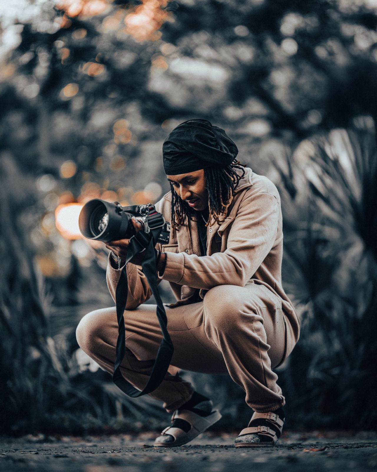 Behind the scenes of an outdoor shoot with a long lens